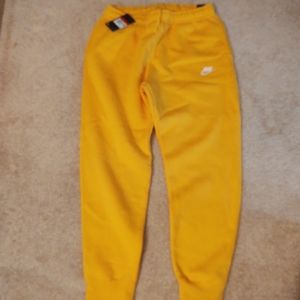 Nike mens jogger yellow /gold in color size Large
